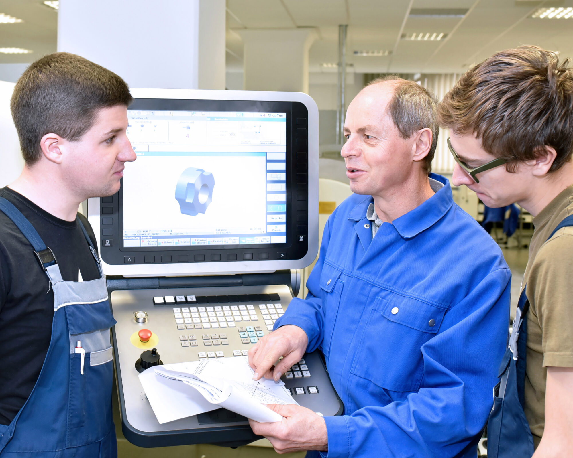 Group of young people in technical vocational training with teac